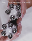 close up of the iron head massagers of the facify beauty wand rotating